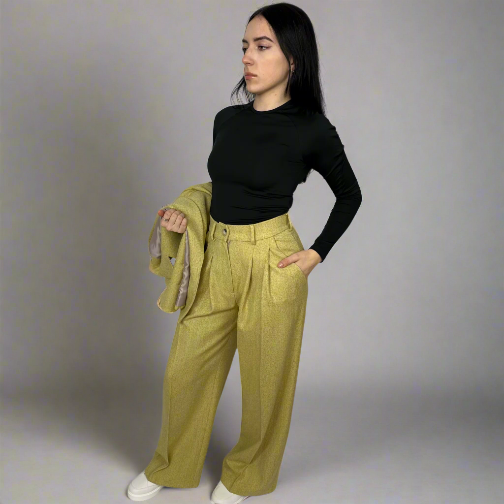Side view of Sartorial Flair’s Camilla Mustard Wide-Leg Trousers, displaying the tailored fit and flow of the high-quality mustard wool fabric.