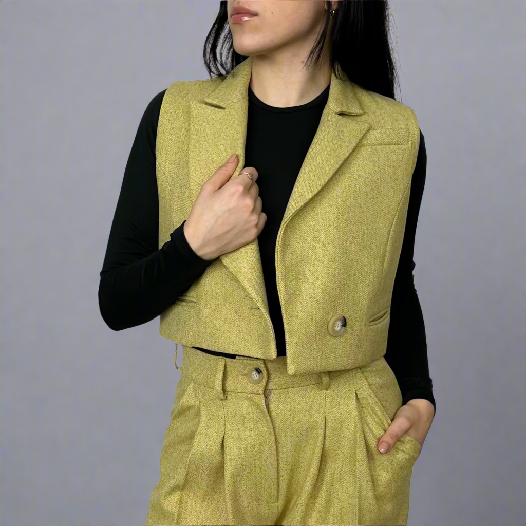 Close-up of the Camilla mustard waistcoat showing the fine texture of the wool and precision in the tailored fit, perfect for a sophisticated wardrobe.